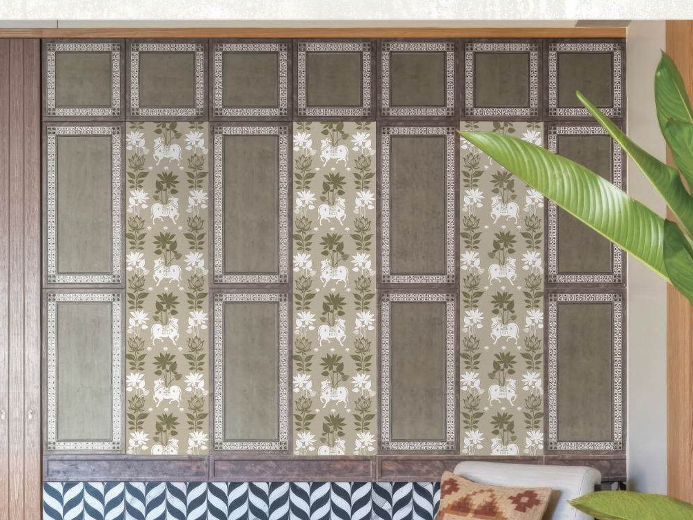 Panelled wall with printed decorative inserts above a bench